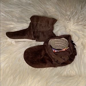 Handmade baby moccasins in brown